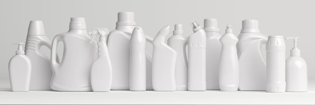 A large collection of plain white chemical cleaner containers against a white background.